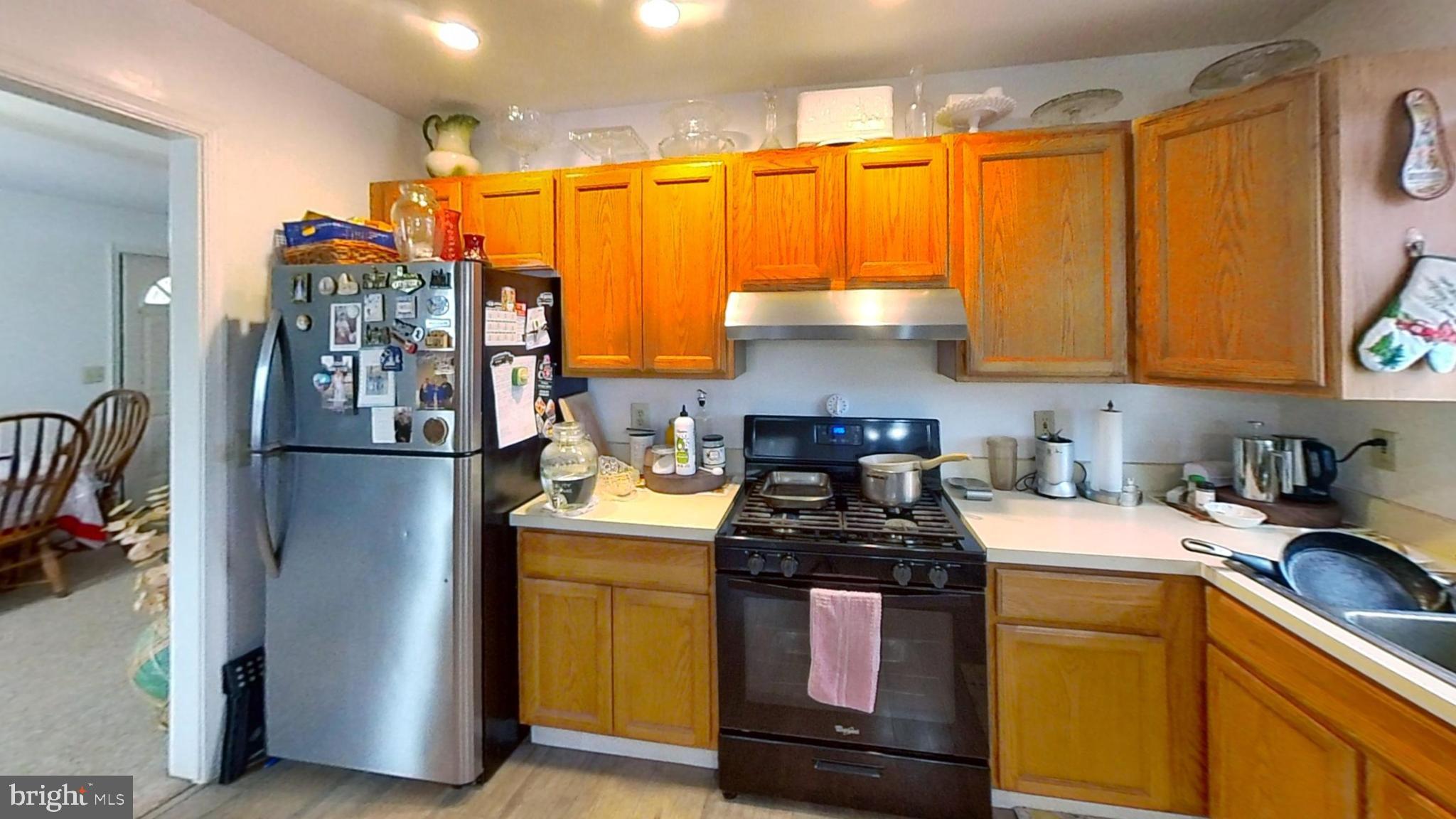 170-174 West Millstream Road Cream Ridge, NJ 08514 - Photo 82 of 109 a kitchen with stainless steel appliances granite countertop a stove a sink and a refrigerator