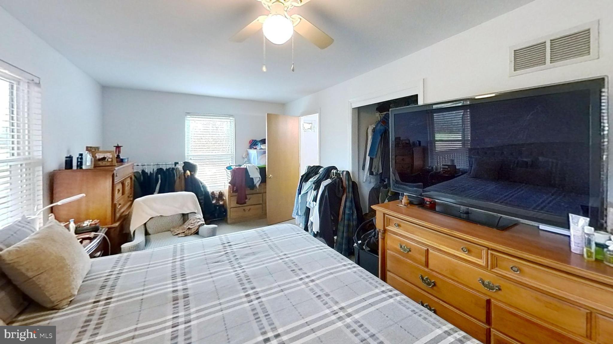 170-174 West Millstream Road Cream Ridge, NJ 08514 - Photo 84 of 109 a bed room with a bed and a television