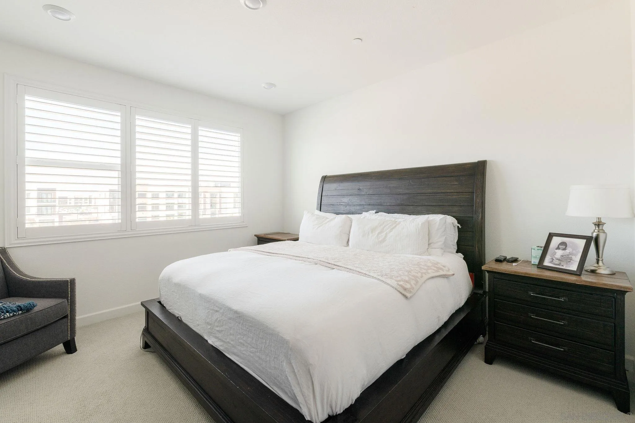 1983 Elevate Way Chula Vista, CA 91915 - Photo 11 of 39 a bedroom with a bed and a window