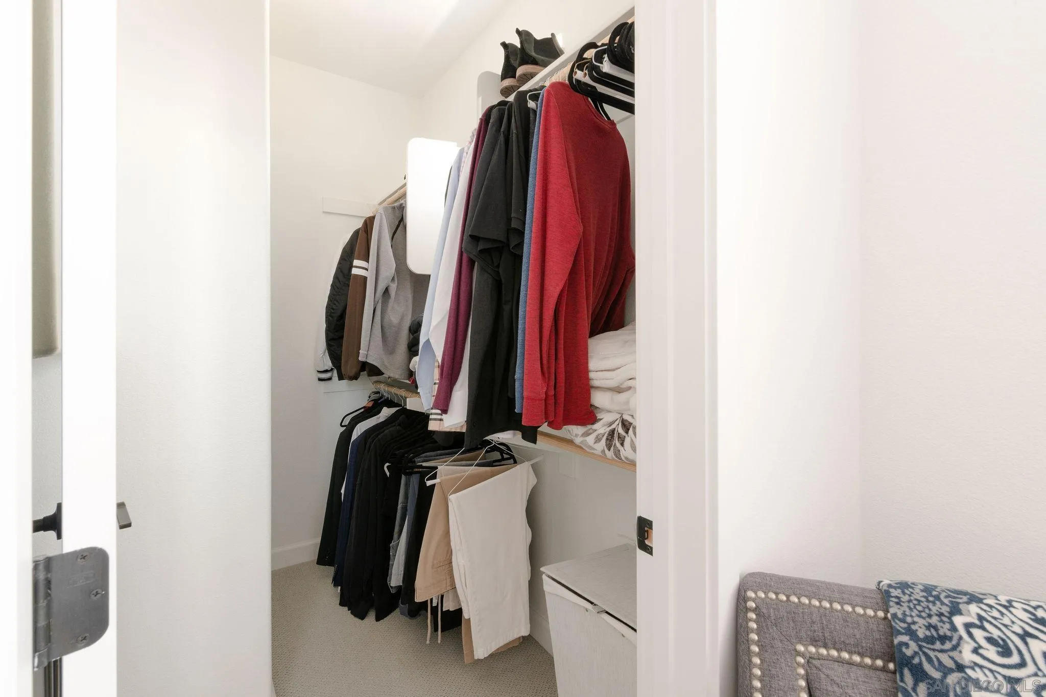 1983 Elevate Way Chula Vista, CA 91915 - Photo 19 of 39 a view of walk in closet with clothes and shoes