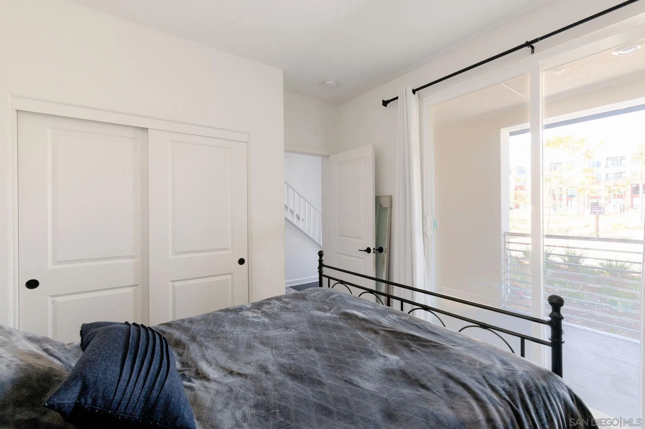 1983 Elevate Way Chula Vista, CA 91915 - Photo 26 of 39 a view of a bedroom with furniture and windows