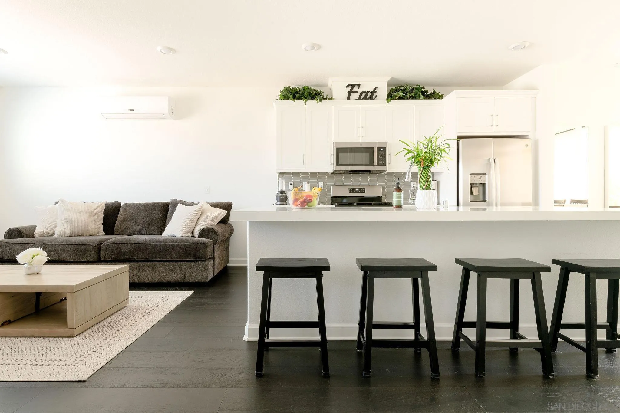1983 Elevate Way Chula Vista, CA 91915 - Photo 5 of 39 a living room with furniture wooden floor and a table