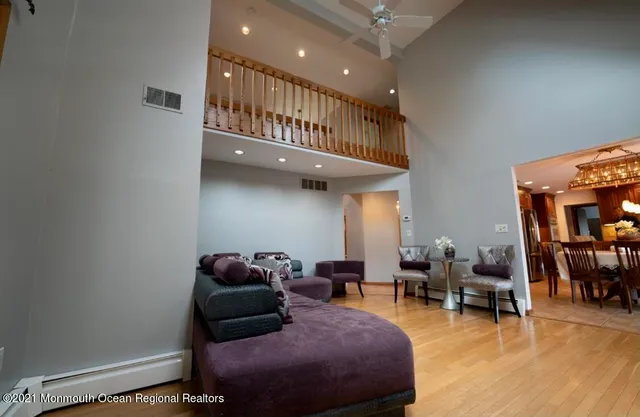 a living room with furniture and a table