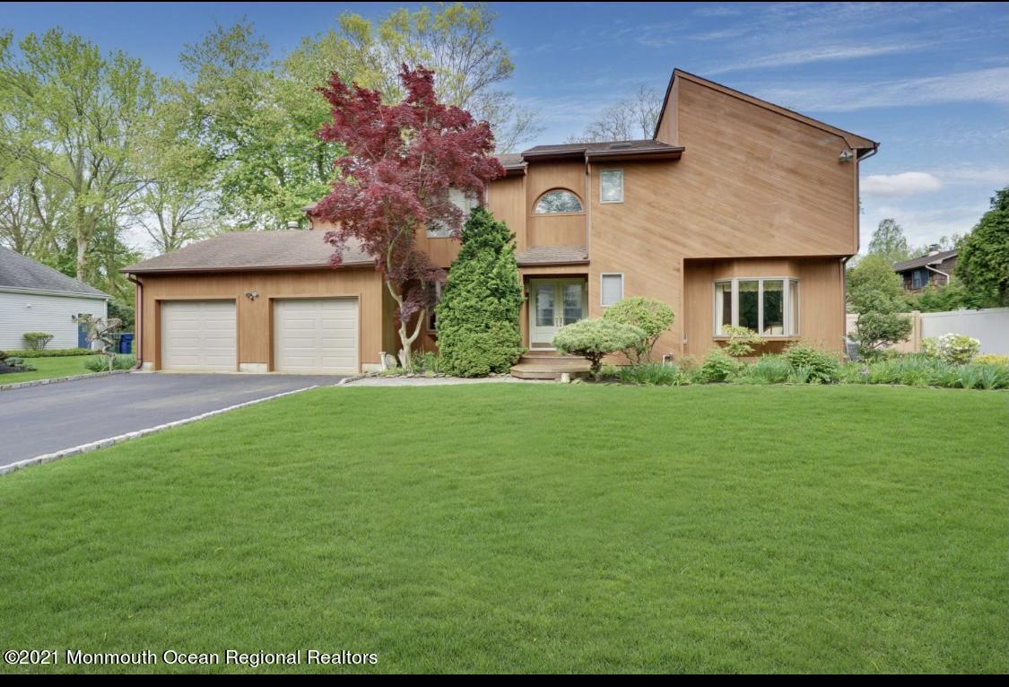 1706 Fanwood Street Oakhurst, NJ 07755 - Photo 12 of 26 a front view of house with yard and green space