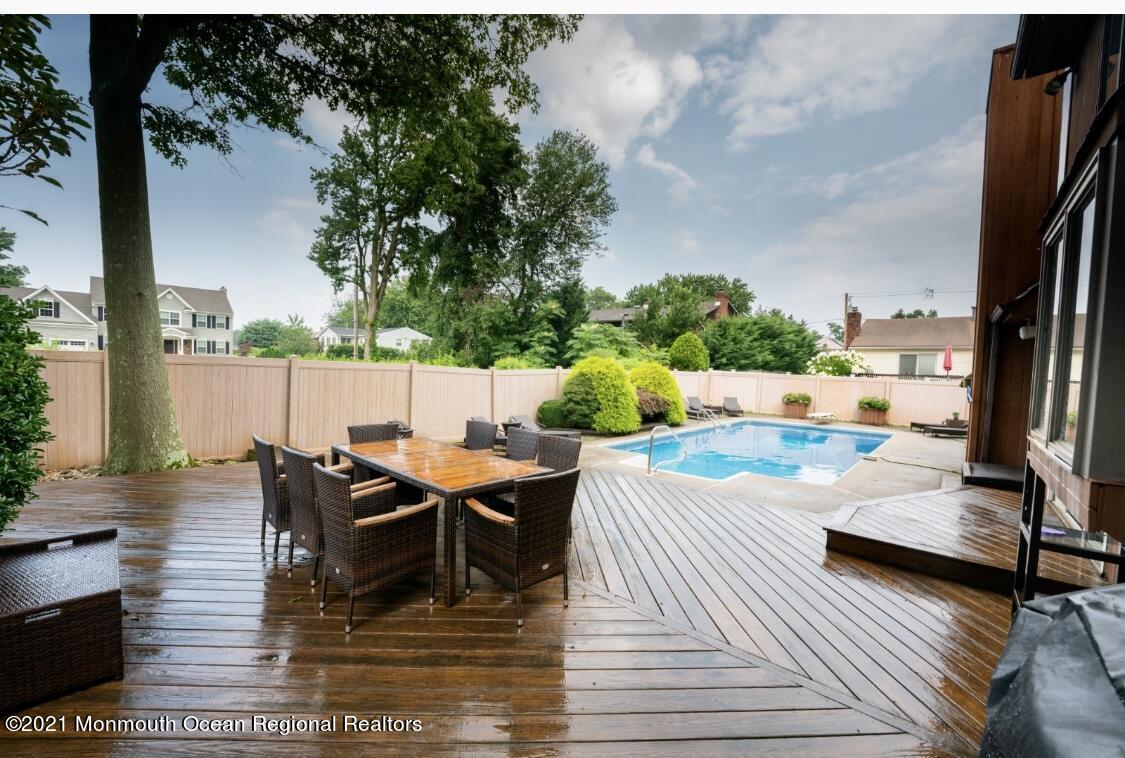 1706 Fanwood Street Oakhurst, NJ 07755 - Photo 13 of 26 swimming pool view with a seating space