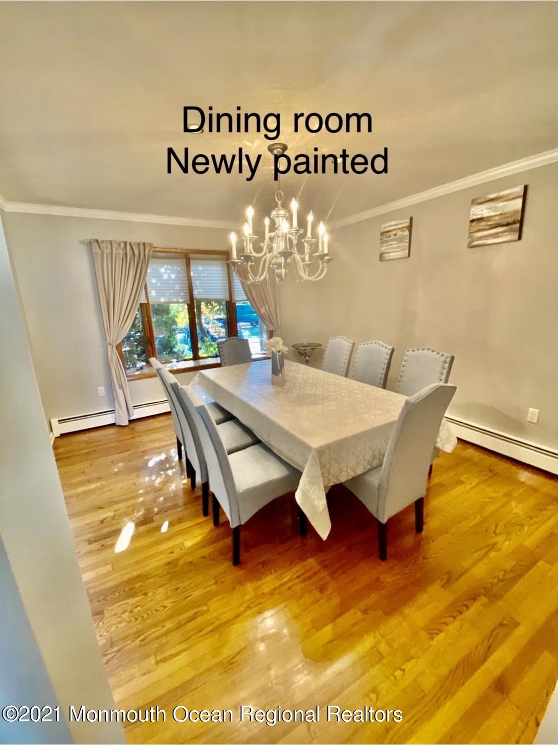 1706 Fanwood Street Oakhurst, NJ 07755 - Photo 5 of 26 a living room with furniture and a table