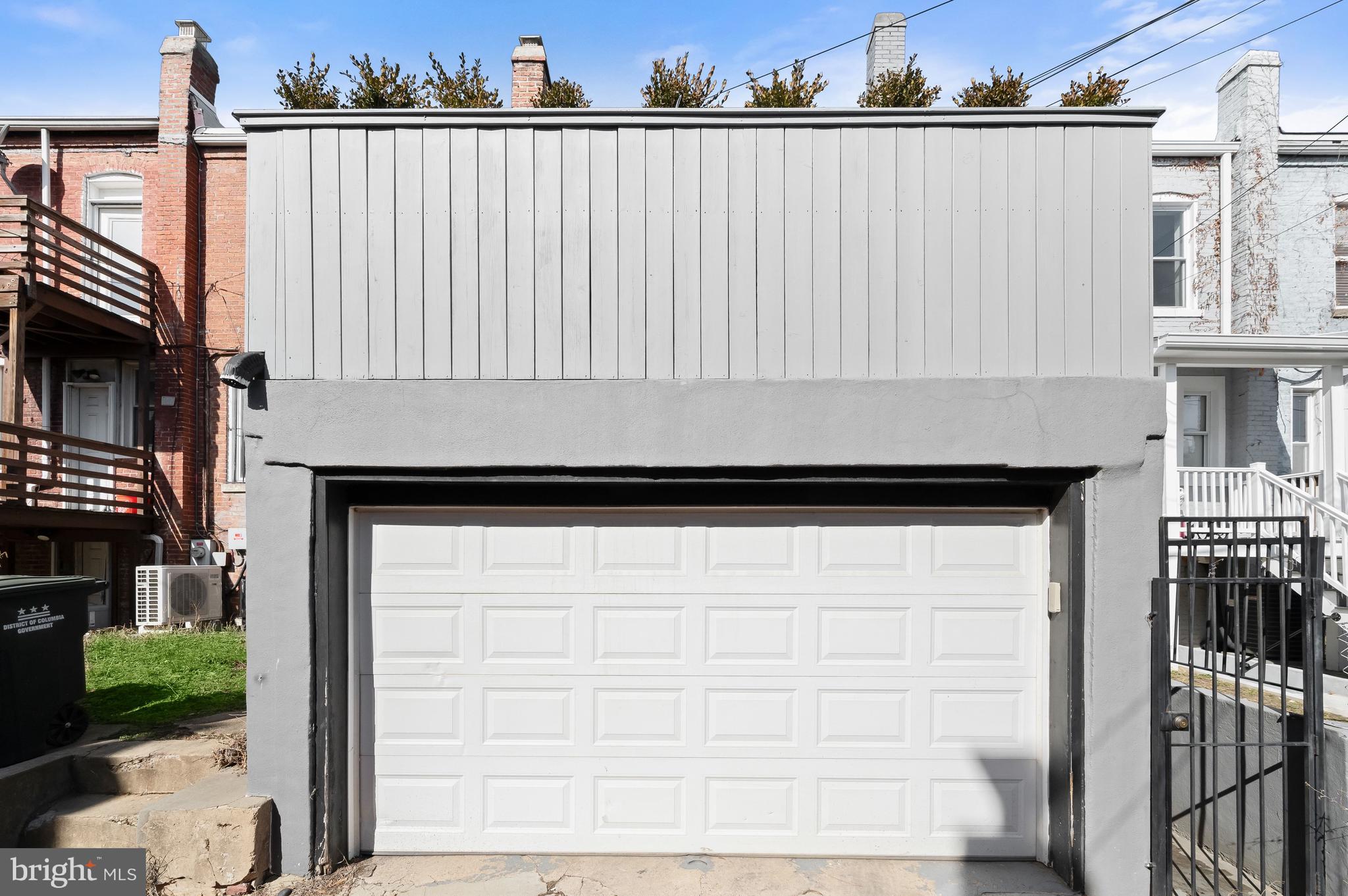 151 Uhland Terrace Northeast Washington, DC 20002 - Photo 21 of 21 Garage with landscaped outdoor patio above