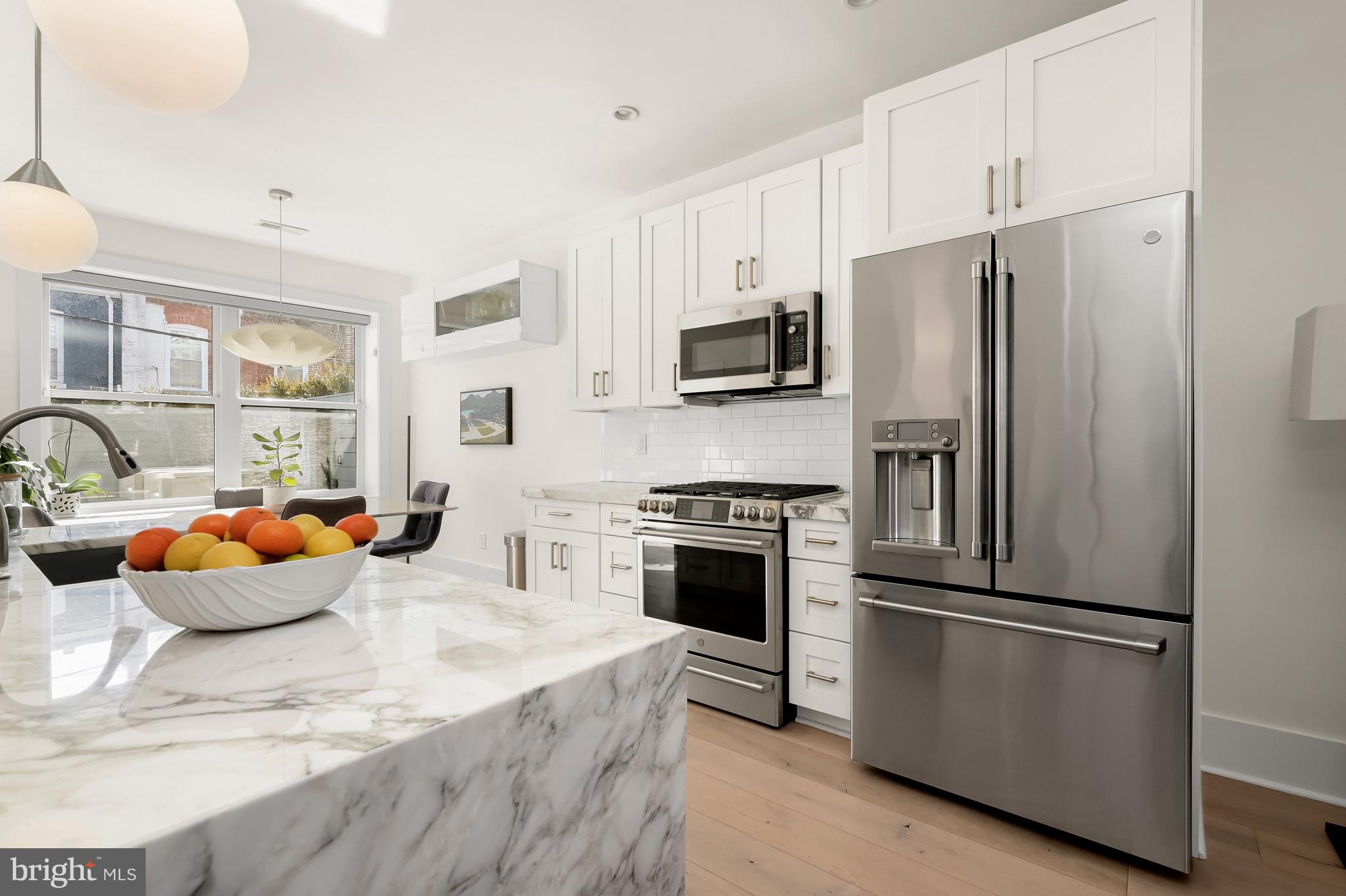 151 Uhland Terrace Northeast Washington, DC 20002 - Photo 5 of 21 Kitchen features a 6 burner gas stove