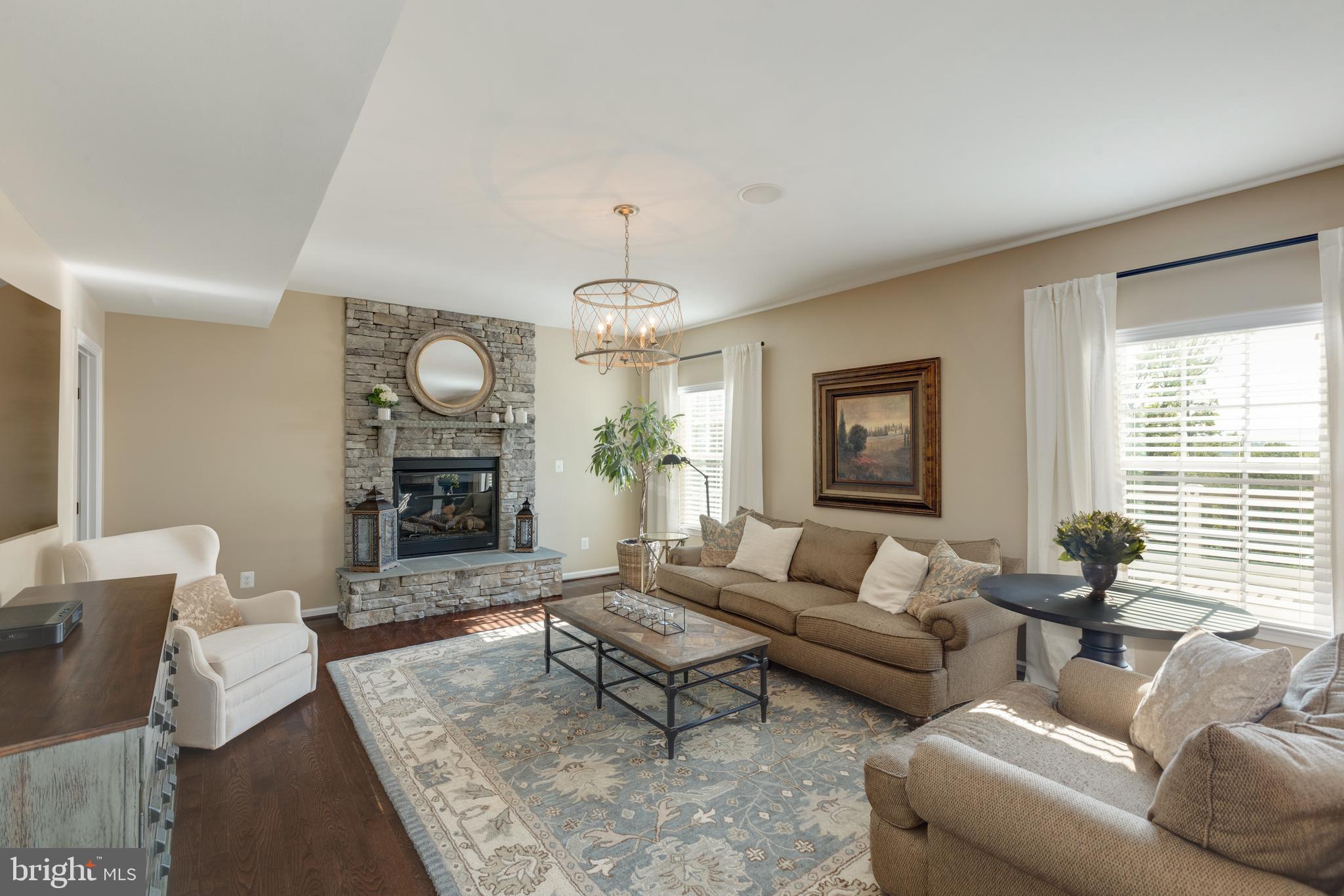 25821 Racing Sun Drive Aldie, VA 20105 - Photo 13 of 54 Floor to ceiling stone fireplace!