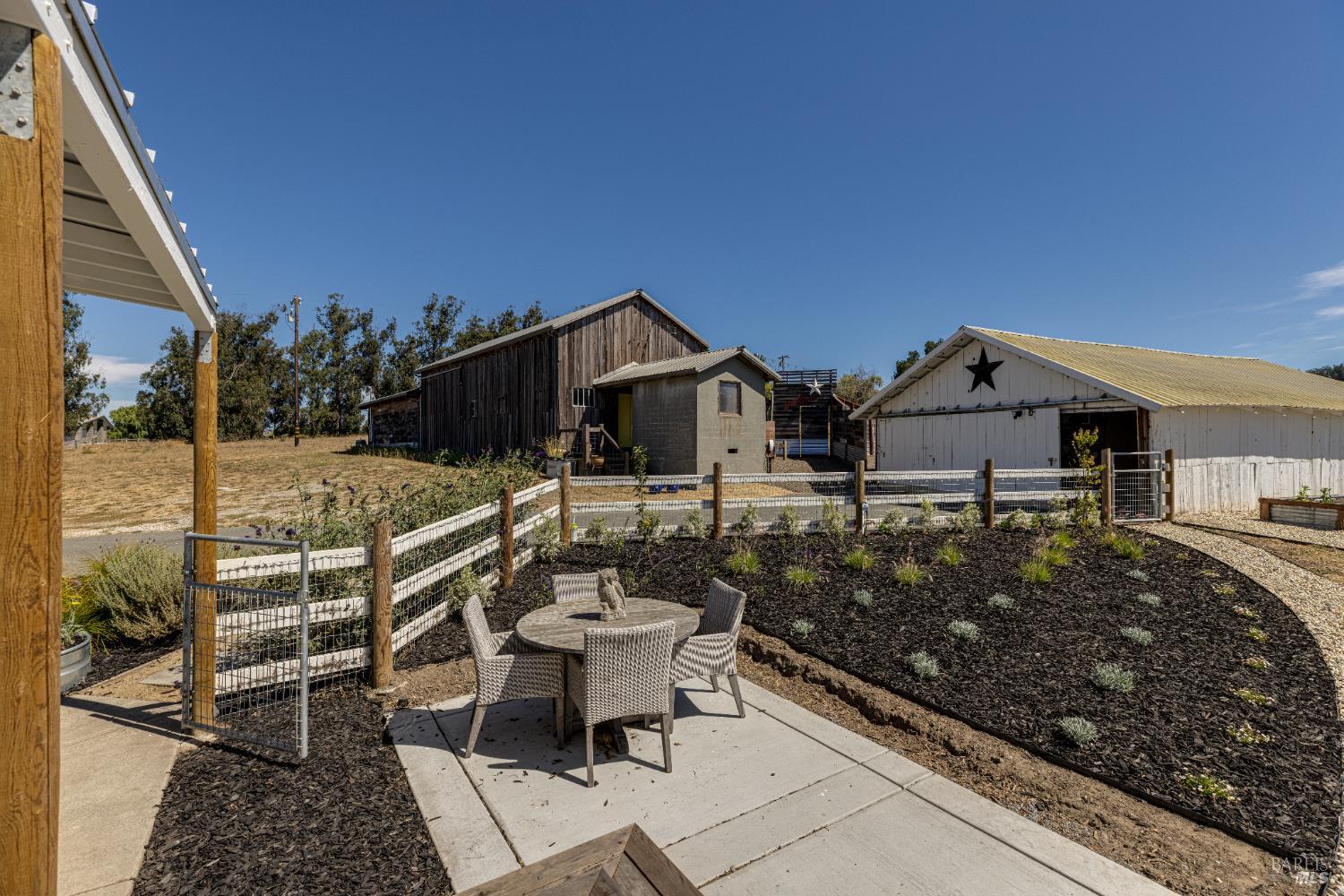 3150 Pepper Road Petaluma, CA 94952 - Photo 47 of 85 View of the front yard, barn and detached garage from the porch steps.