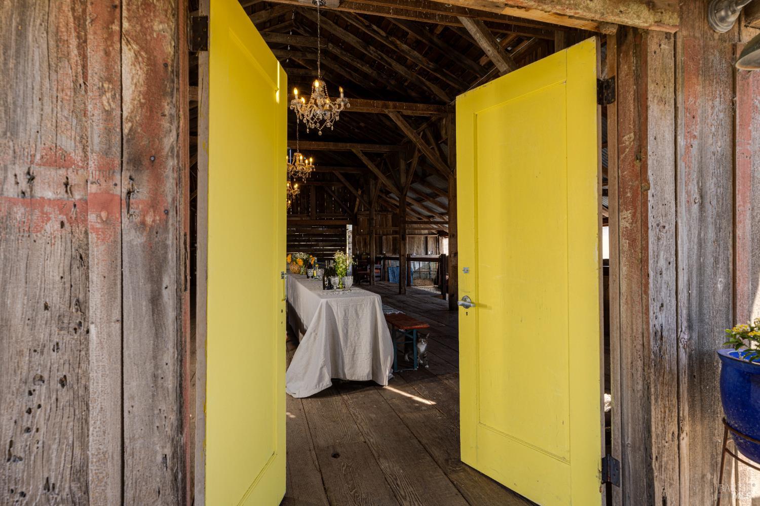 3150 Pepper Road Petaluma, CA 94952 - Photo 55 of 85 Nothing says "Party time" like vibrant yellow doors into the large barn!