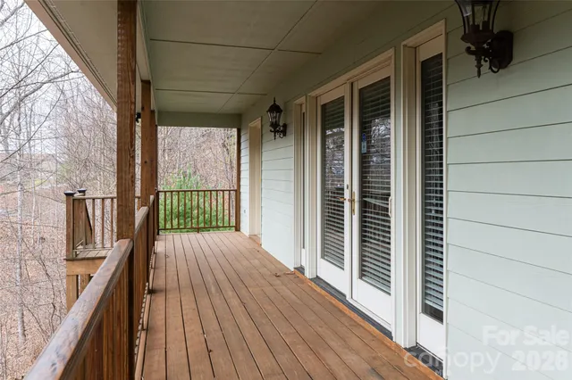 a view of a house with a yard and roof