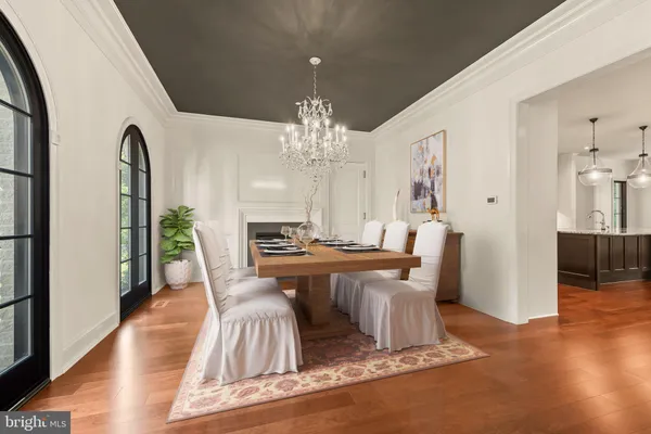 a view of an empty room with exposed radiator and fireplace