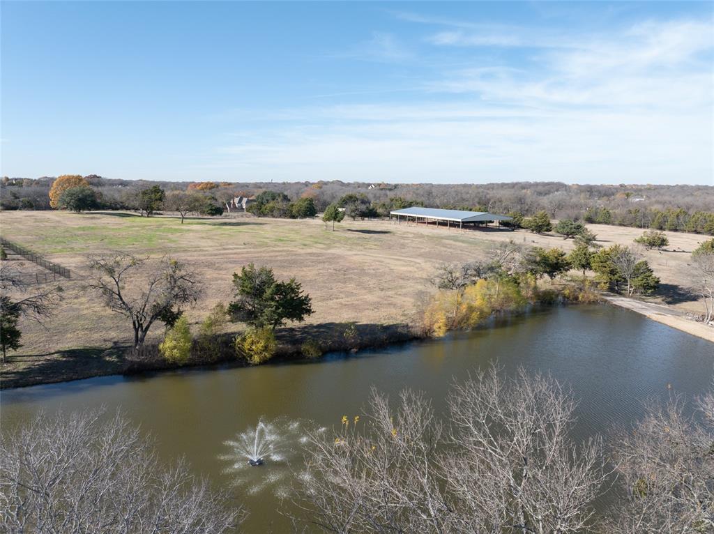 930 Cowboy Court Lucas, TX 75002 - Photo 18 of 31 an aerial view of ocean and residential houses with outdoor space