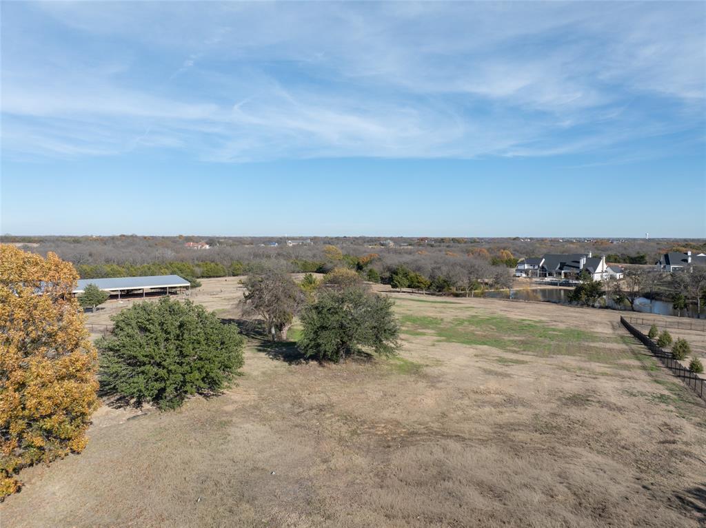 930 Cowboy Court Lucas, TX 75002 - Photo 23 of 31 an aerial view of ocean and residential houses with outdoor space