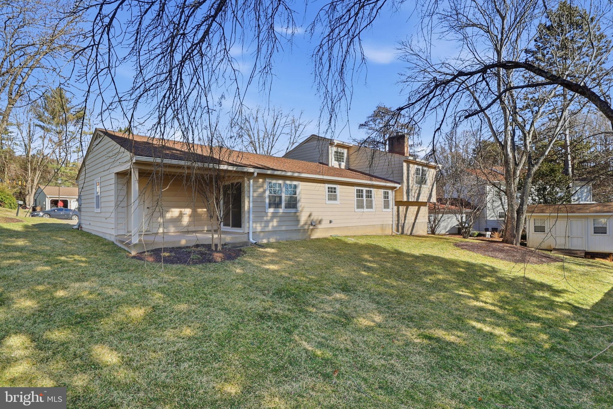 5207 Ruffner Woods Court Burke, VA 22015 - Photo 27 of 29 a view of a house with a yard