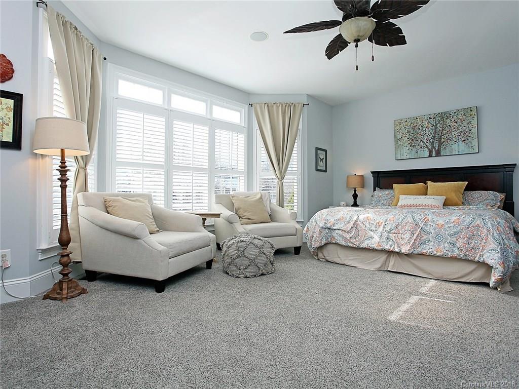 174 Mills Lane Fort Mill, SC 29708 - Photo 22 of 36 a bedroom with furniture and a large window