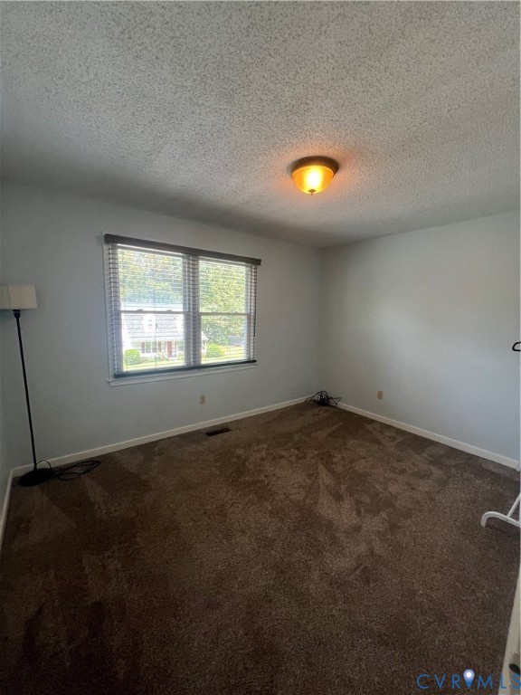 303 Bull Run Drive Hopewell, VA 23860 - Photo 10 of 16 a view of an empty room with a window