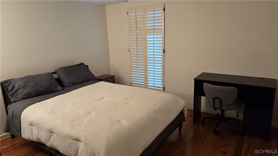 10312 Iron Mill Road Richmond, VA 23235 - Photo 14 of 22 Bedroom with dark hardwood / wood-style floors