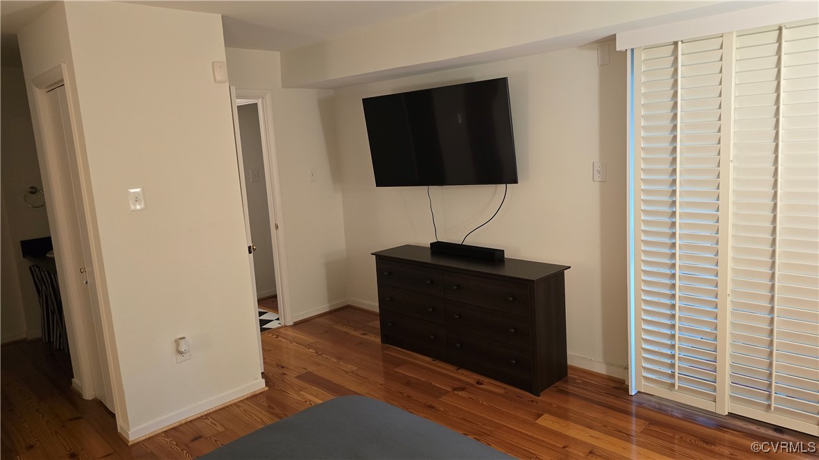 10312 Iron Mill Road Richmond, VA 23235 - Photo 18 of 22 Bedroom featuring dark wood-type flooring
