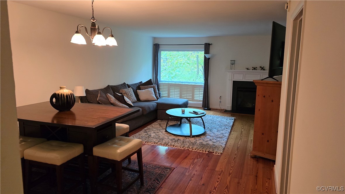 10312 Iron Mill Road Richmond, VA 23235 - Photo 3 of 22 Living room featuring dark wood-type flooring and