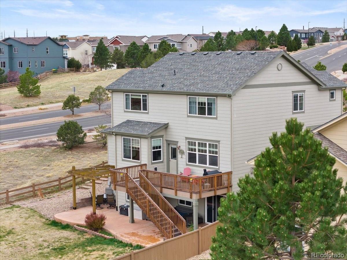 1906 Charbray Point Castle Rock, CO 80108 - Photo 37 of 44 an aerial view of a house with swimming pool