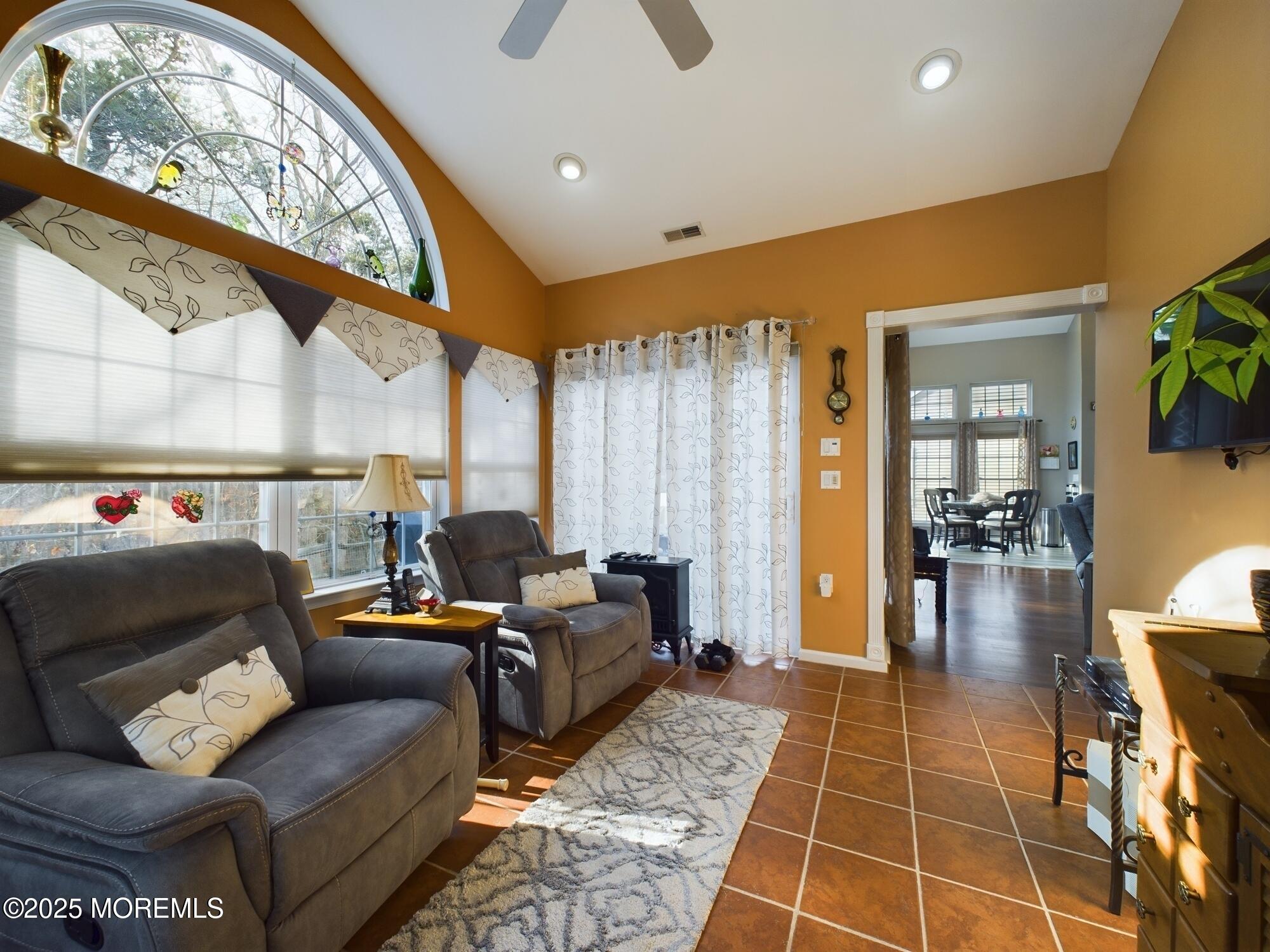 89 Pebble Beach Boulevard Jackson, NJ 08527 - Photo 20 of 42 a living room with furniture and a large window