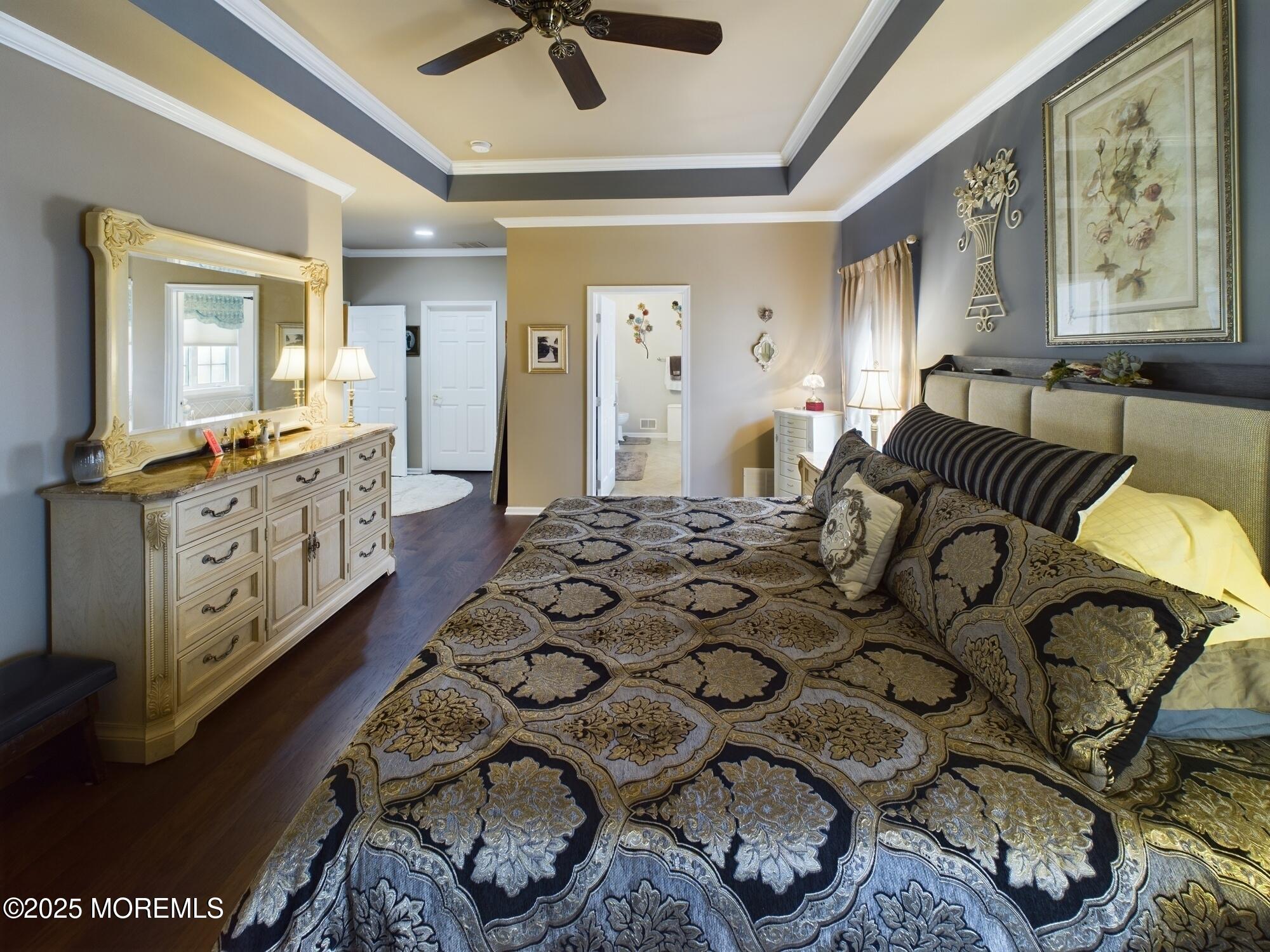89 Pebble Beach Boulevard Jackson, NJ 08527 - Photo 25 of 42 a spacious bedroom with a bed a couch and dresser