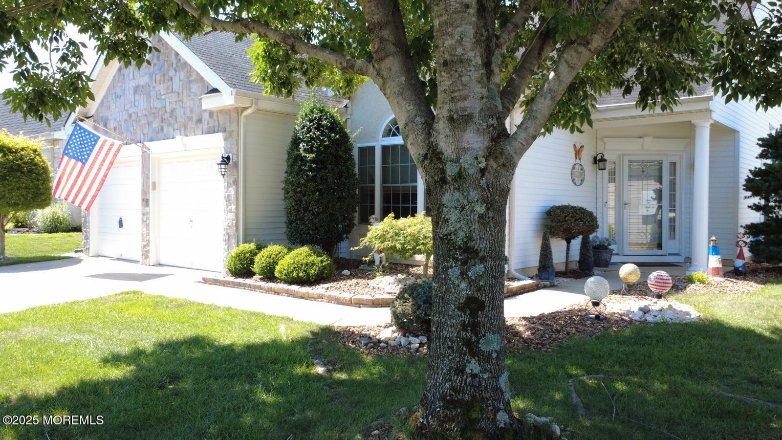 89 Pebble Beach Boulevard Jackson, NJ 08527 - Photo 3 of 42 a view of a house with backyard and sitting area