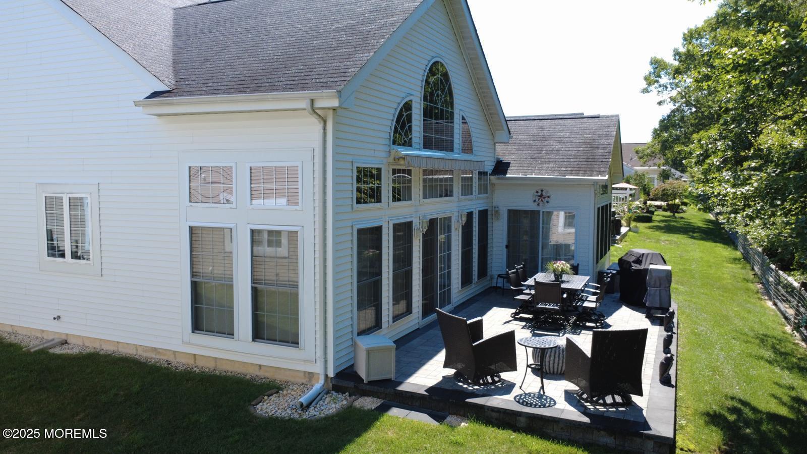 89 Pebble Beach Boulevard Jackson, NJ 08527 - Photo 40 of 42 a front view of a house with patio