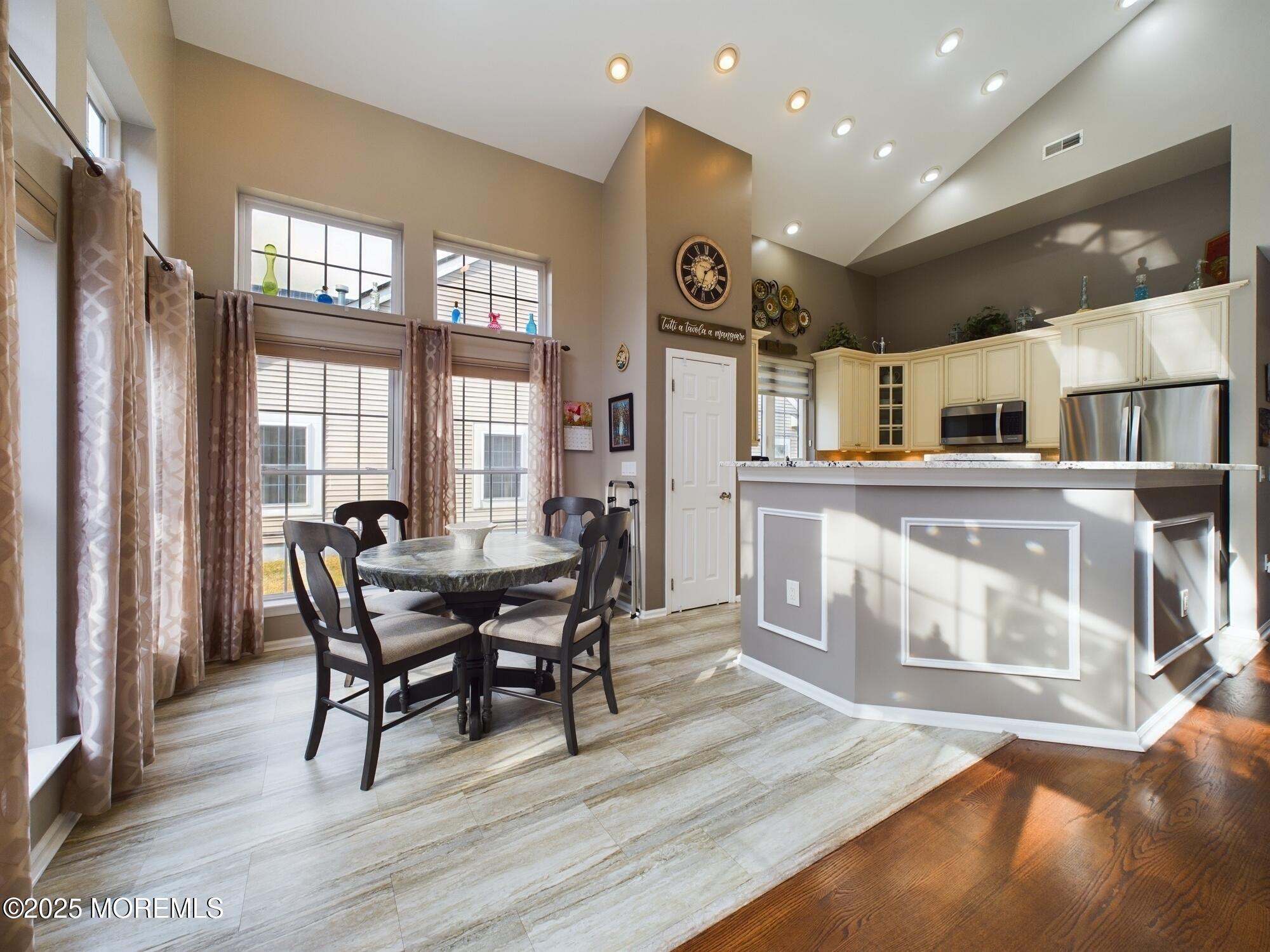 89 Pebble Beach Boulevard Jackson, NJ 08527 - Photo 10 of 42 a view of a dining room with furniture window and wooden floor