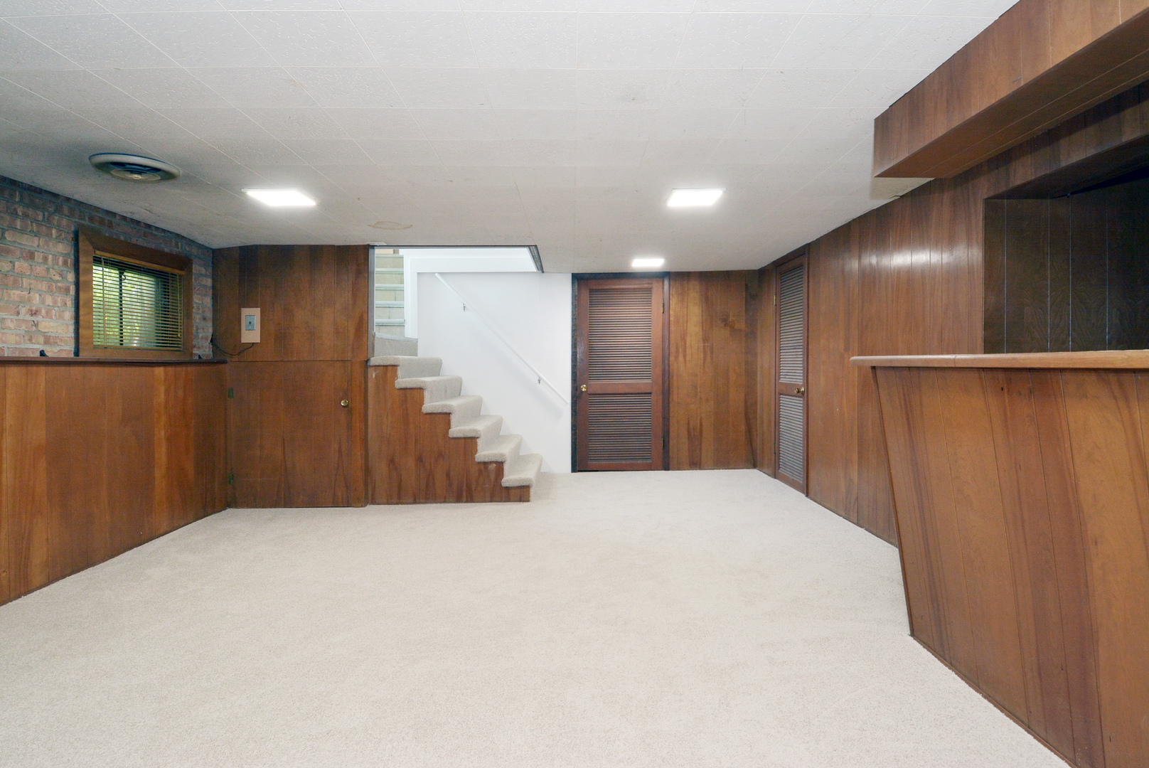 604 South Elmhurst Road South Mount Prospect, IL 60056 - Photo 15 of 18 a view of a livingroom with a staircase
