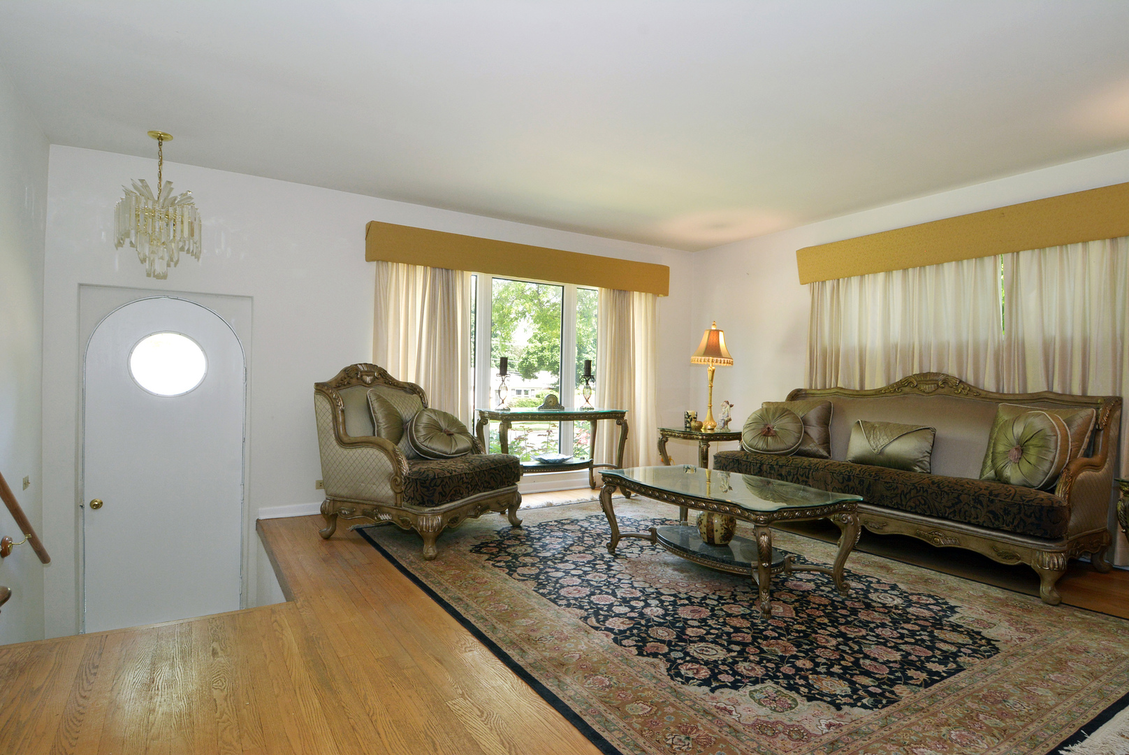 604 South Elmhurst Road South Mount Prospect, IL 60056 - Photo 3 of 18 a living room with furniture and a large window