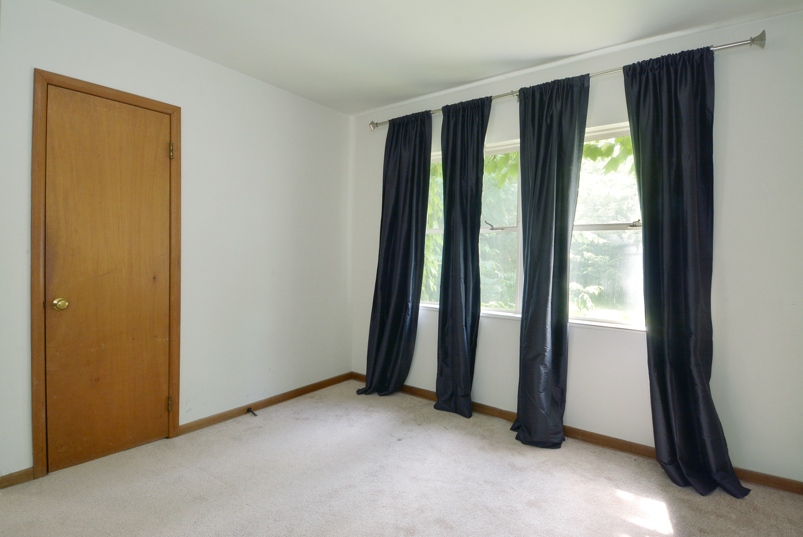 604 South Elmhurst Road South Mount Prospect, IL 60056 - Photo 8 of 18 a view of room with window and floor to ceiling window