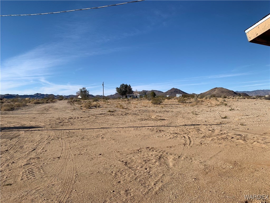 5118 Cordes Road Golden Valley, AZ 86413 - Photo 15 of 17 View of yard with a mountain view