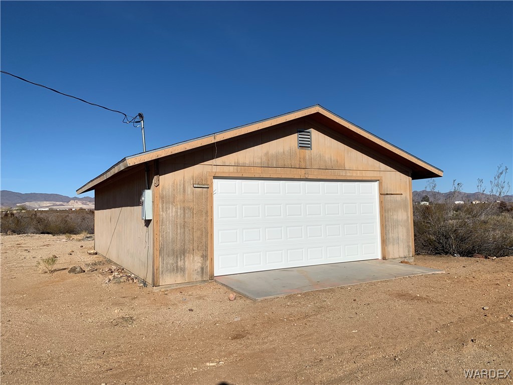 5118 Cordes Road Golden Valley, AZ 86413 - Photo 7 of 17 Detached garage featuring a mountain view