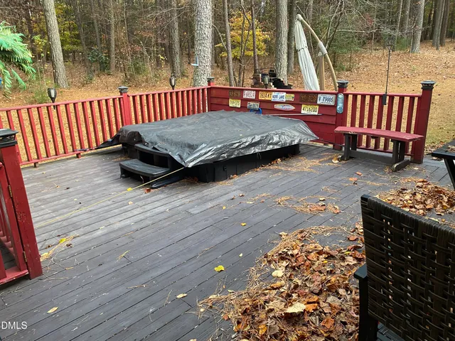 a view of outdoor space with wooden fence