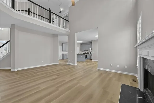 a view of an entryway with wooden floor