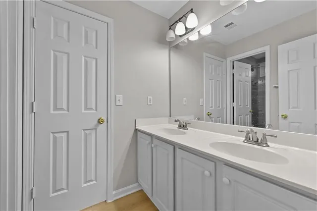 a view of entryway with wooden floor and stairs