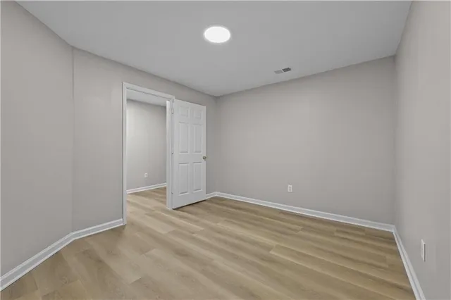 a view of a house with backyard and porch