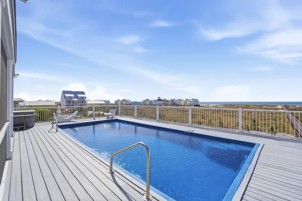 a view of a house with a roof deck