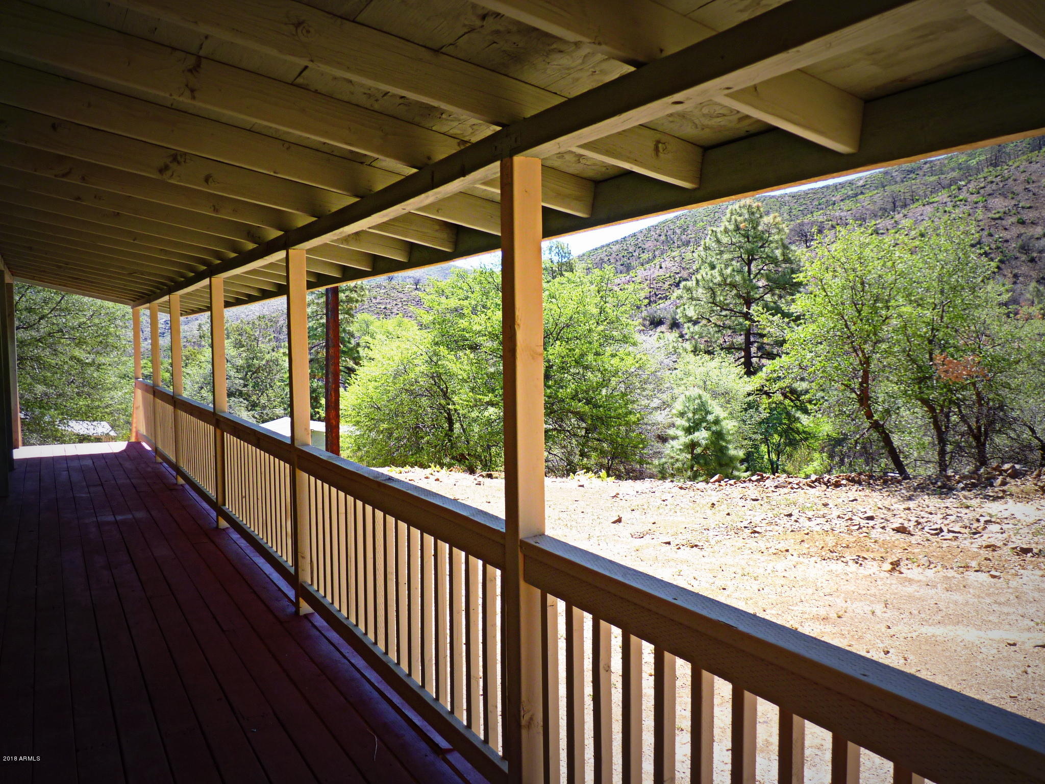 8001 Poland Road Mayer, AZ 86333 - Photo 30 of 76 Main House Open Porch_Deck View a