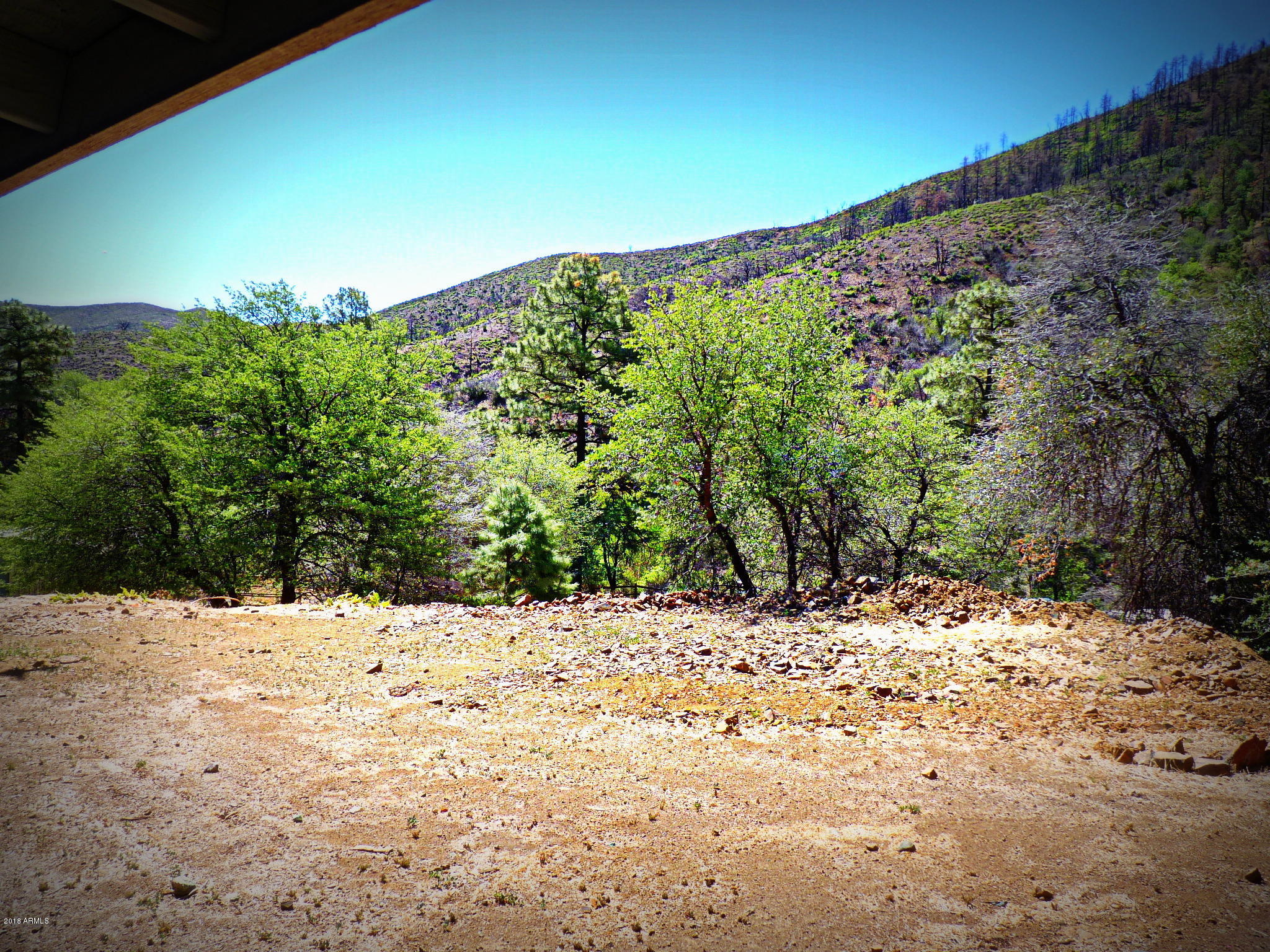 8001 Poland Road Mayer, AZ 86333 - Photo 32 of 76 Main House Open Porch_Deck View d