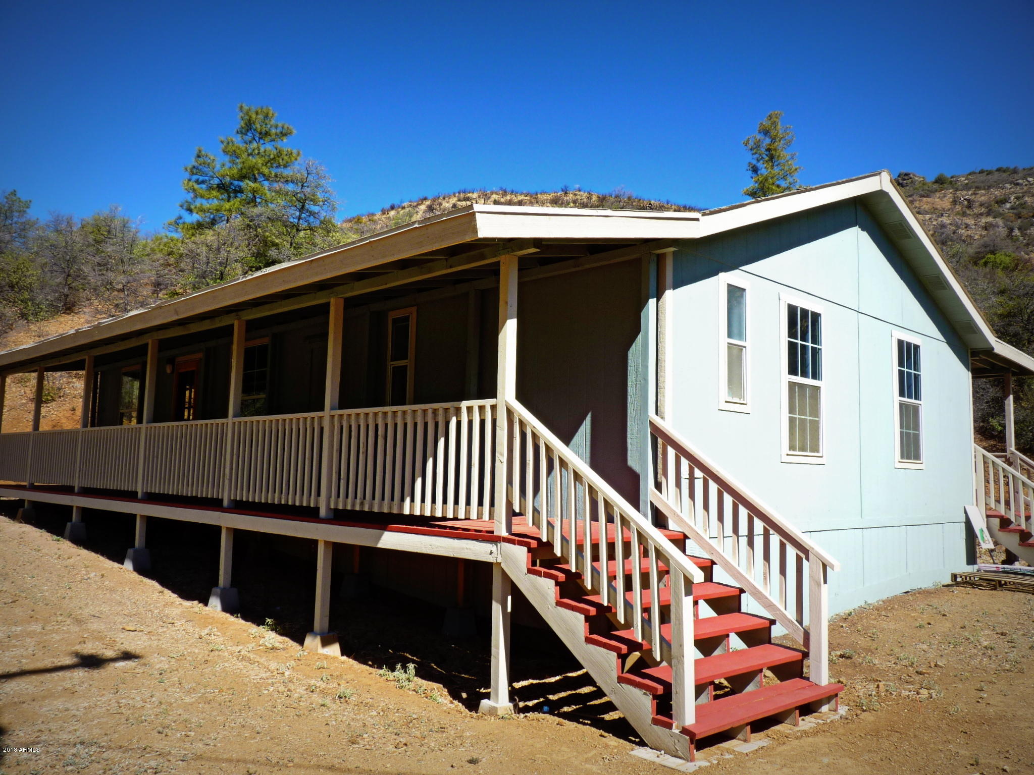 8001 Poland Road Mayer, AZ 86333 - Photo 36 of 76 Main House_View of the Open_Covered Porc