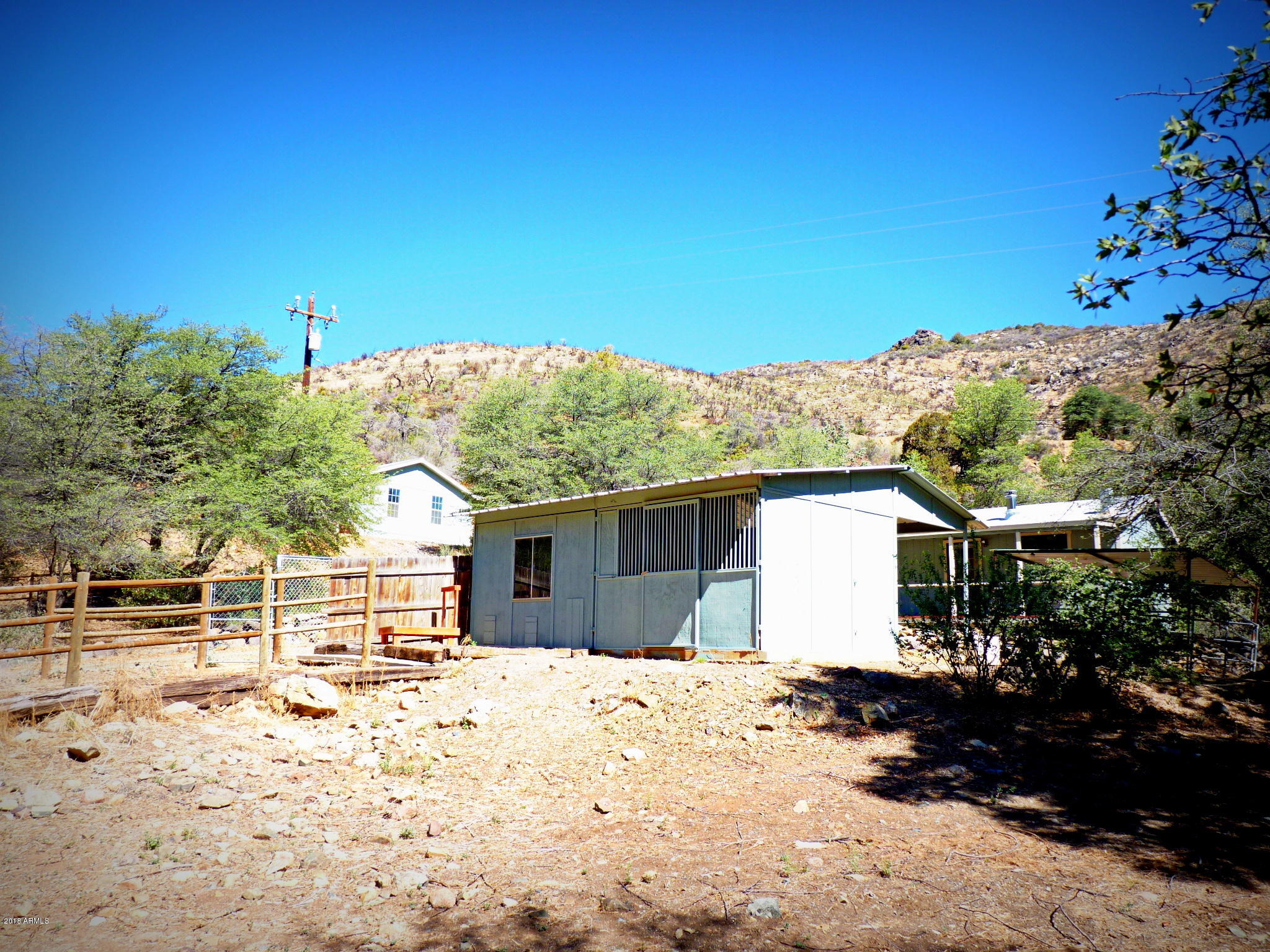 8001 Poland Road Mayer, AZ 86333 - Photo 50 of 76 Horse Stall & Tack Room View from a Corn