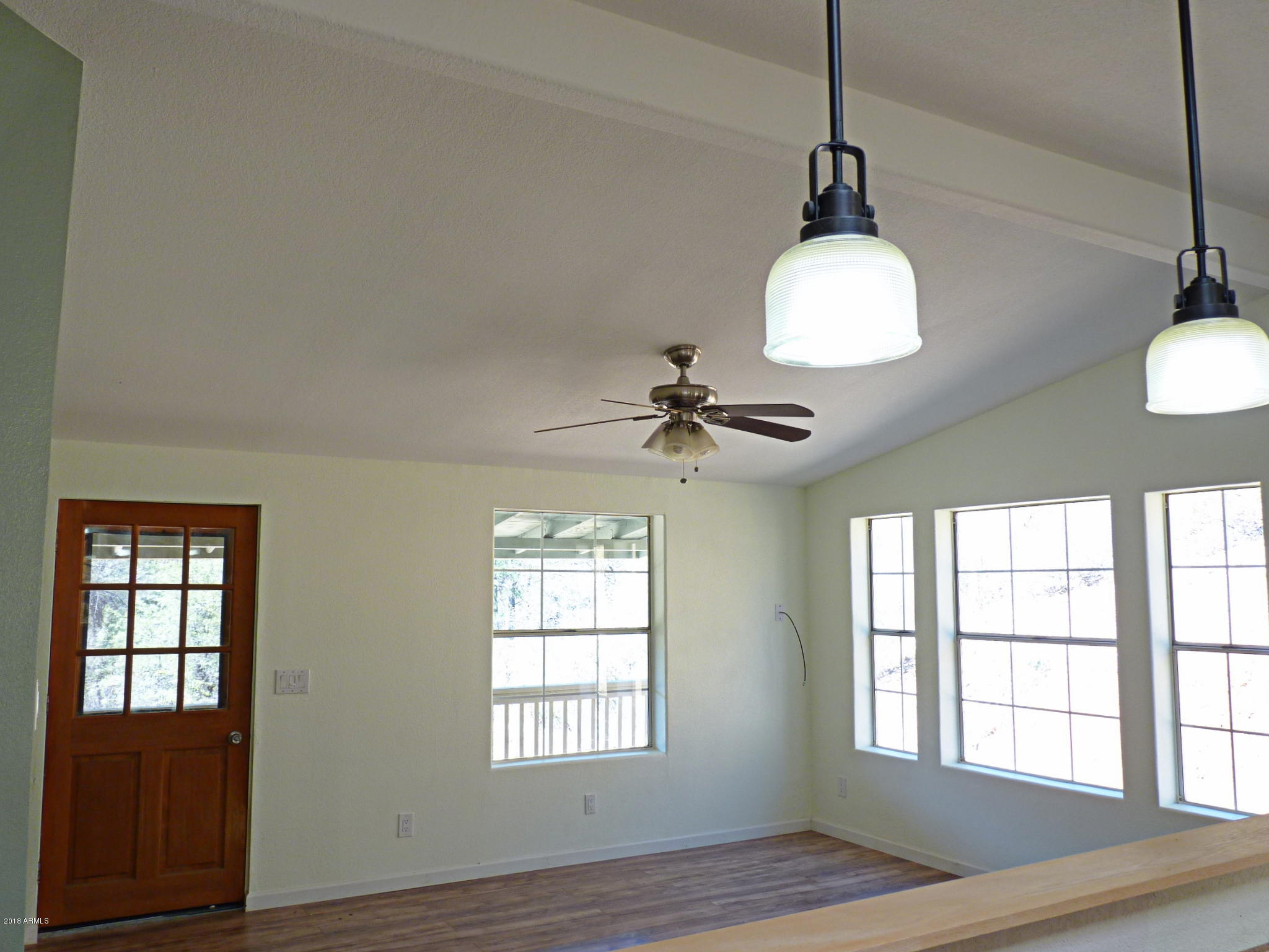 8001 Poland Road Mayer, AZ 86333 - Photo 9 of 76 Main House Kitchen view into the Living