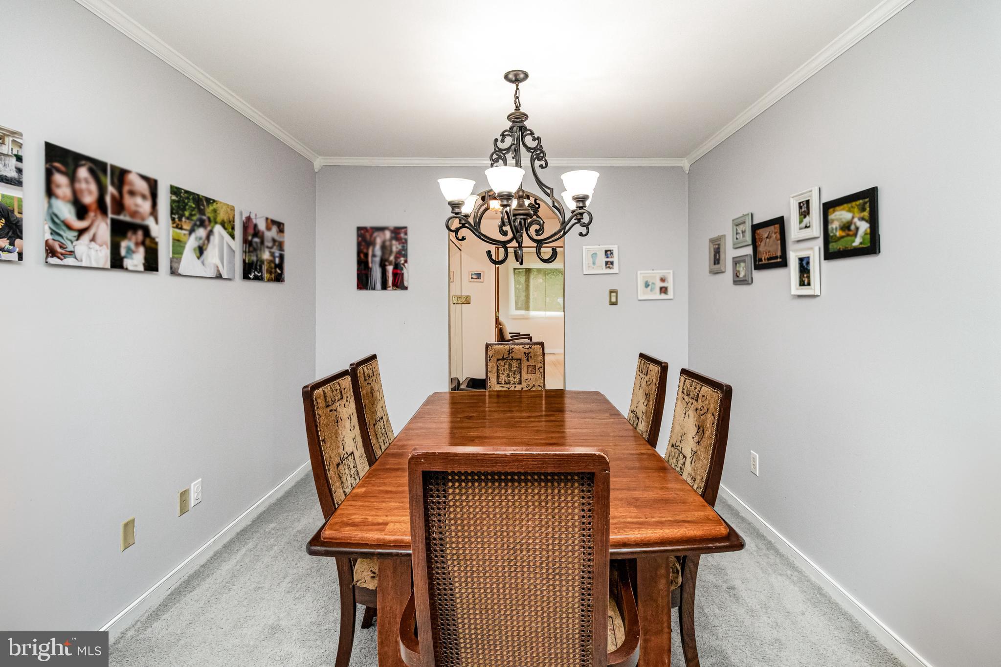 5212 Farmcrest Circle Prince George, VA 23875 - Photo 13 of 27 a view of a dining room with furniture and wooden floor