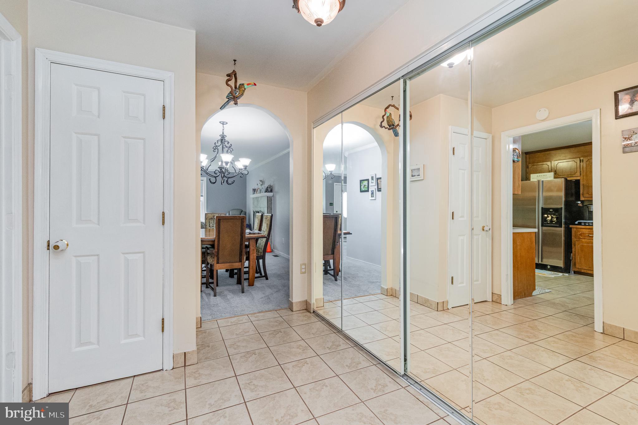 5212 Farmcrest Circle Prince George, VA 23875 - Photo 14 of 27 a view of a hallway with wooden shelves
