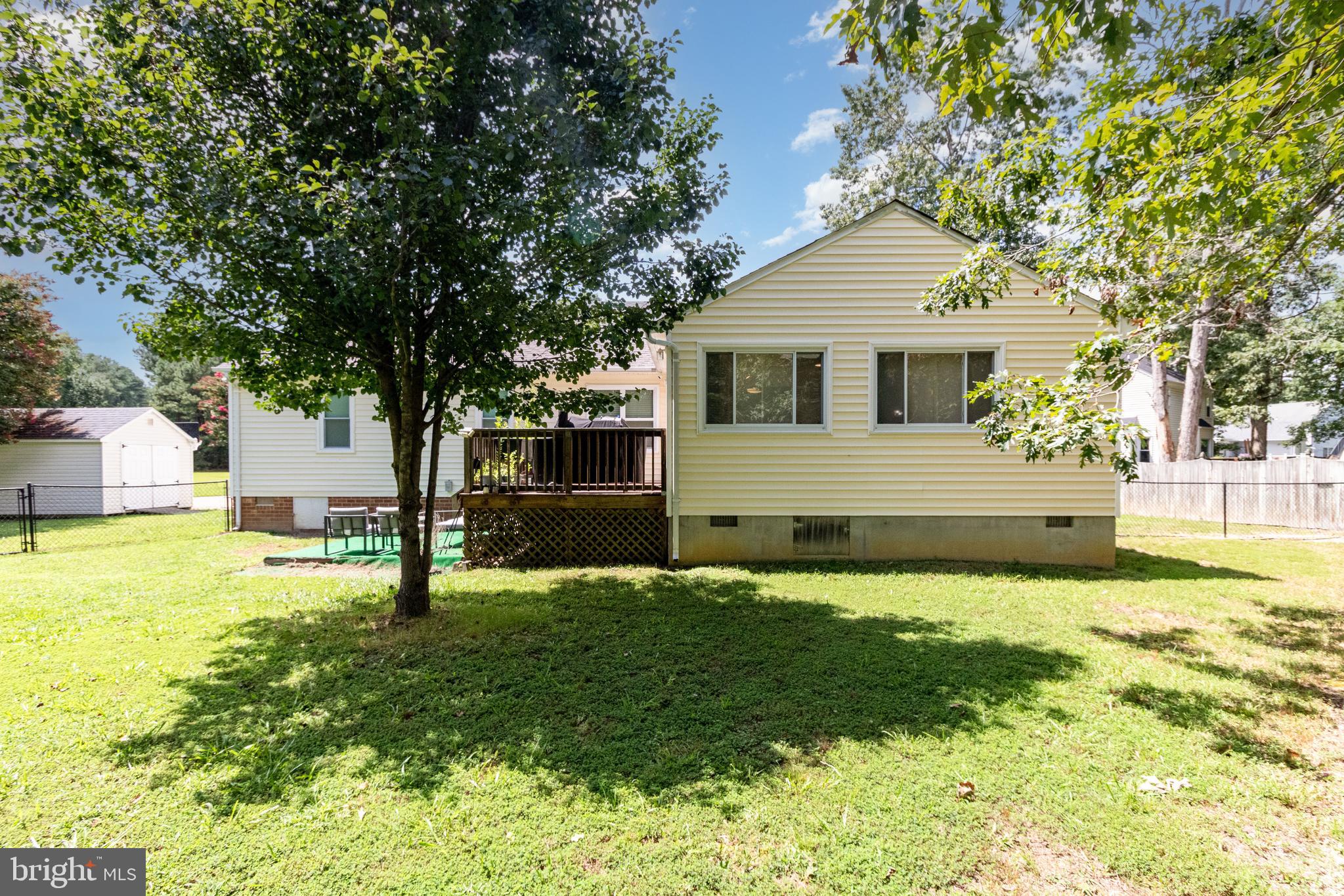 5212 Farmcrest Circle Prince George, VA 23875 - Photo 4 of 27 a front view of house with yard and trees
