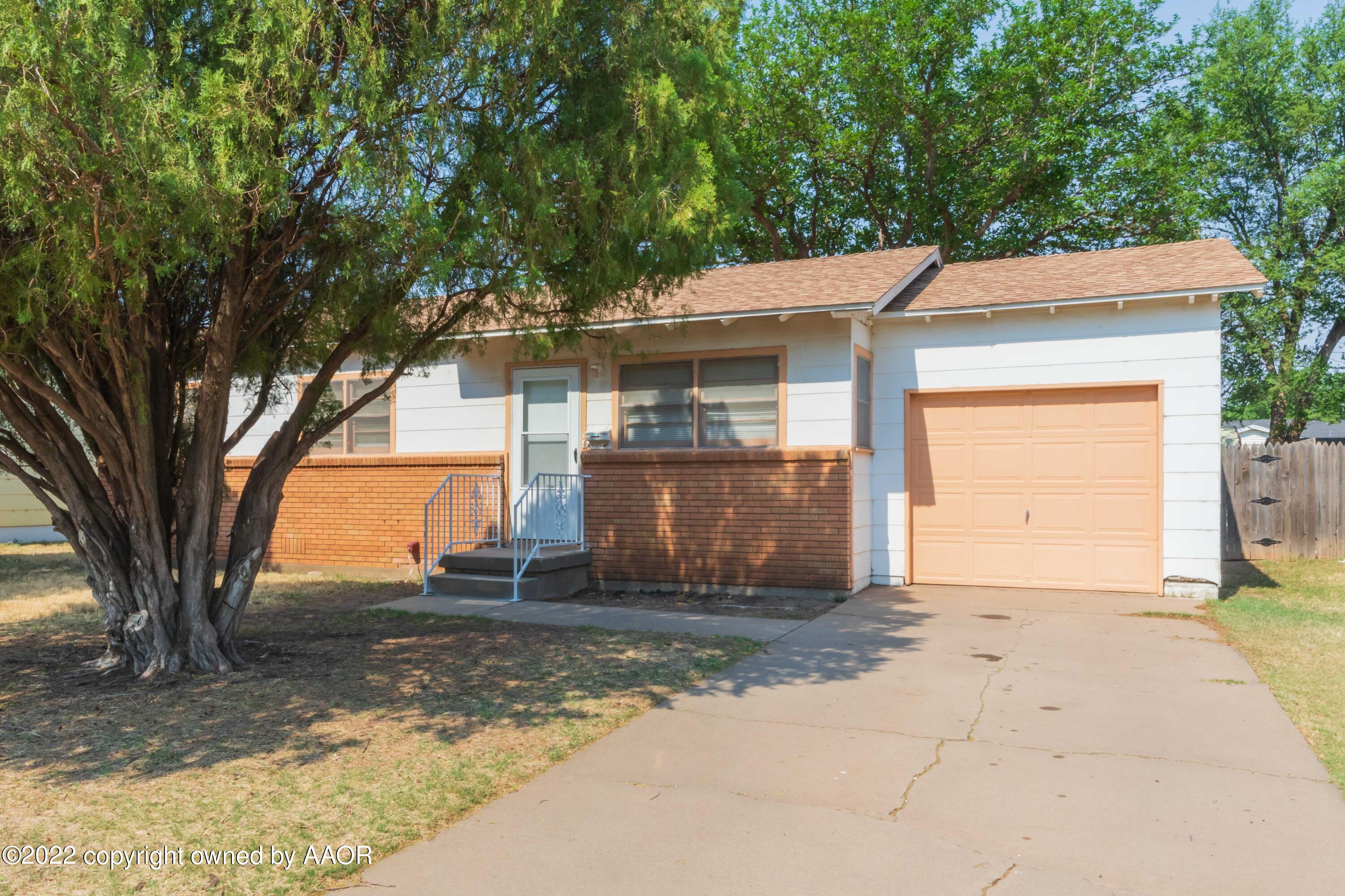 5138 Crockett Street Amarillo, TX 79110 - Photo 1 of 35 a view of a house with a tree